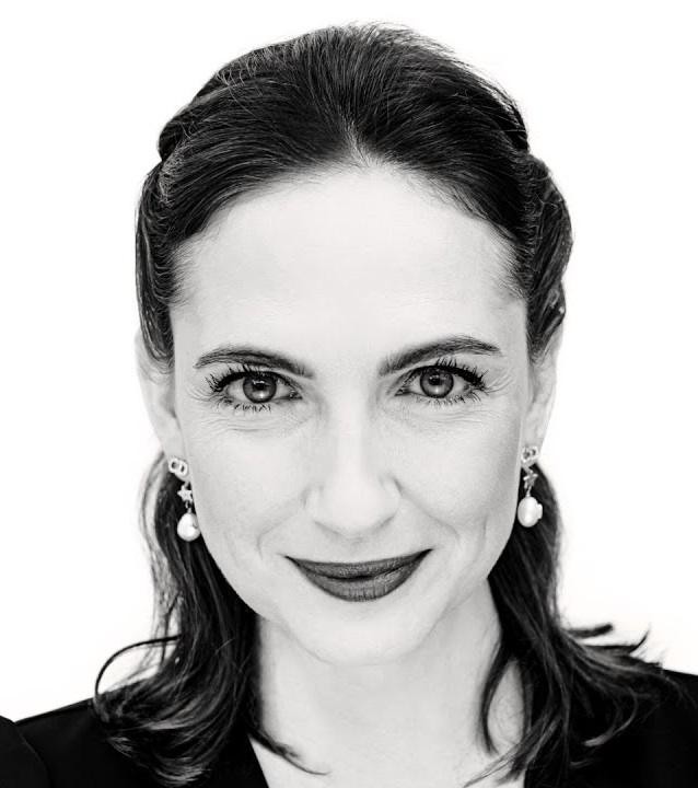 Anna Cieślak na planie filmowym lub teatralnym, ukazująca ekspresję i pasję aktorską.