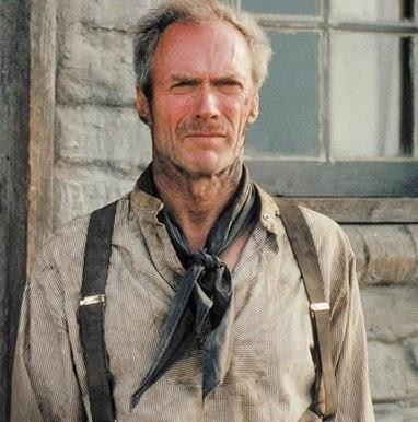 Clint Eastwood w ikonicznej pozie z westernu, symbolizującej jego słynne role kowbojskie.